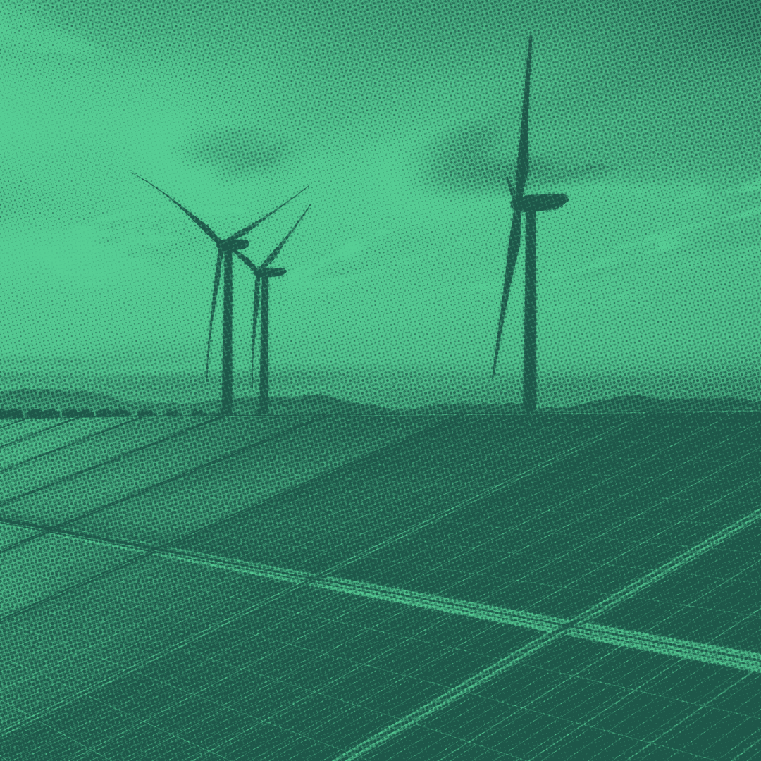 Wind turbines and solar panels at an energy farm 