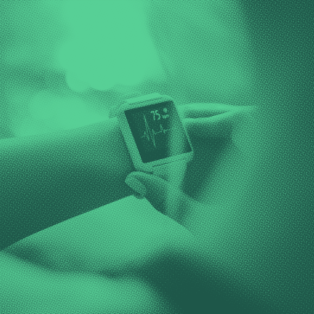 Person checking health data/biometrics on a smart watch