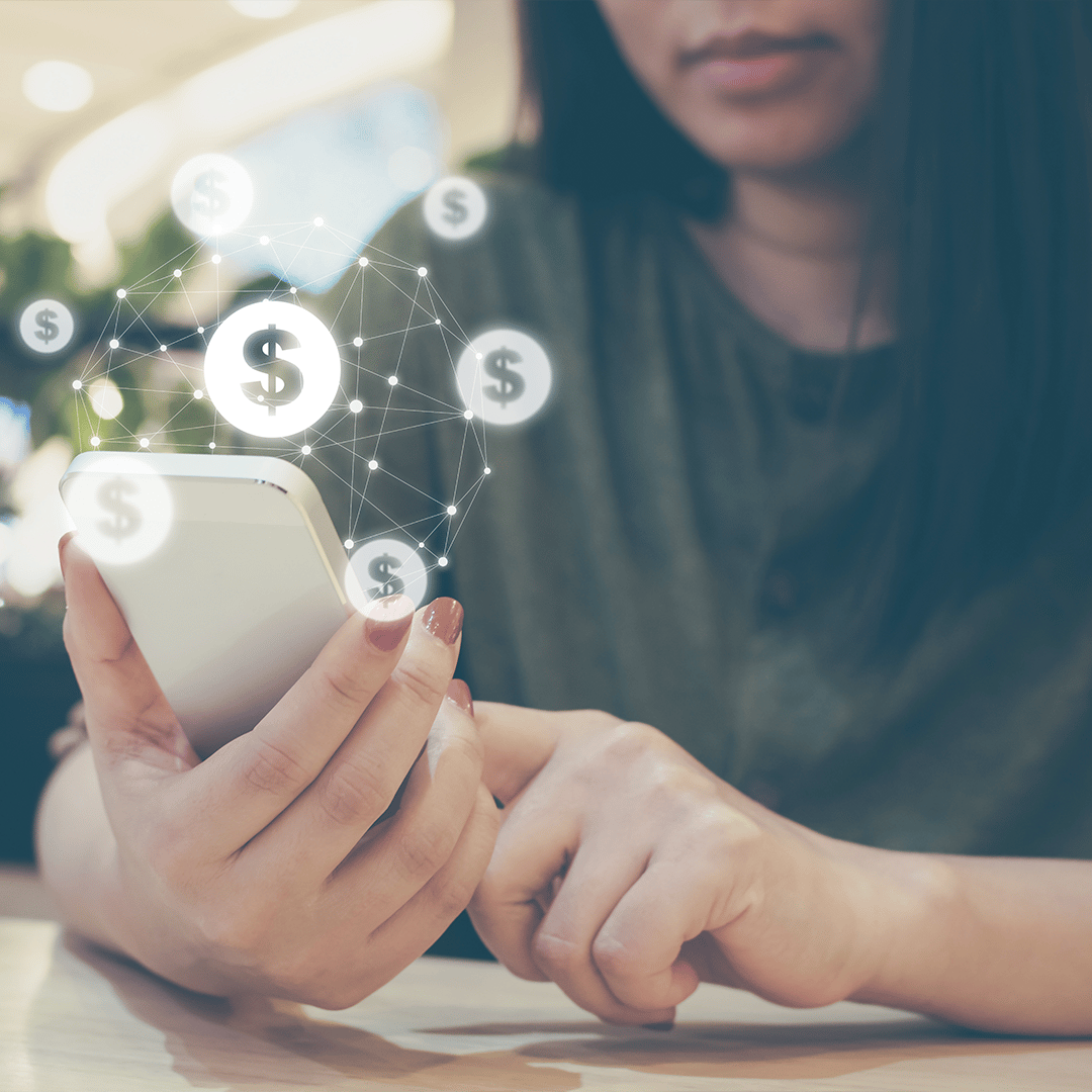 Woman holding phone using financial technology app 